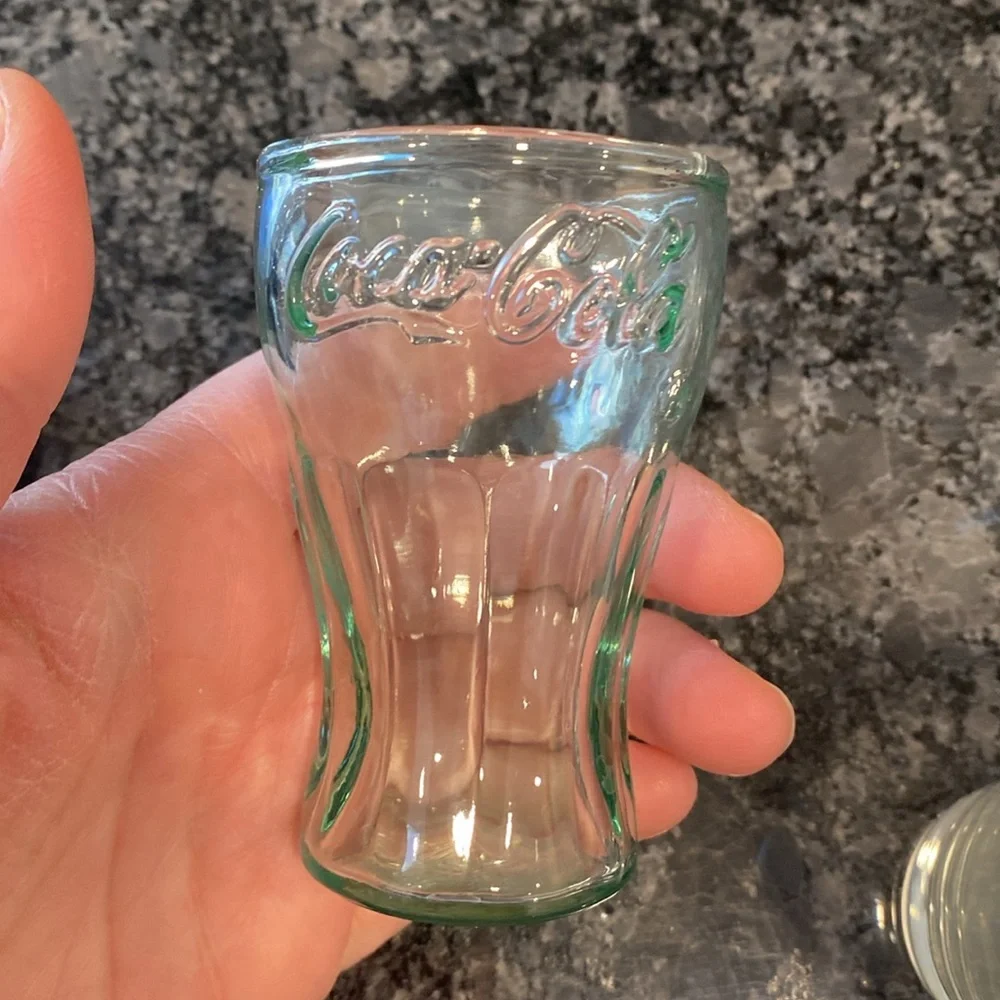 Collection of 7 glass shot glasses, various sizes, and designs Bar accessories